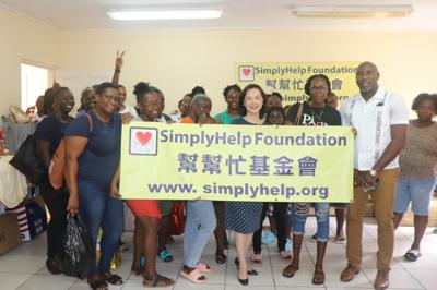 Amb. Fiona Fan with Minister Orando Brewster handed over the resources contributed by SimplyHelp Foundation and a Taiwanese Non-Profit Organization