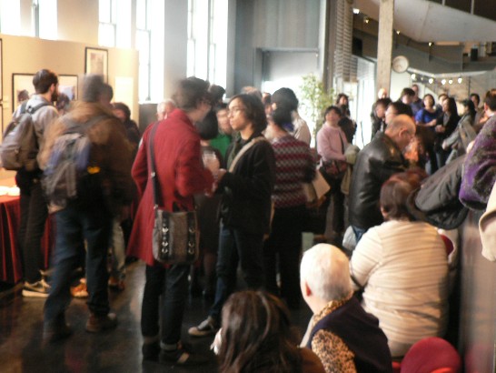 More than 100 people attend the opening reception.