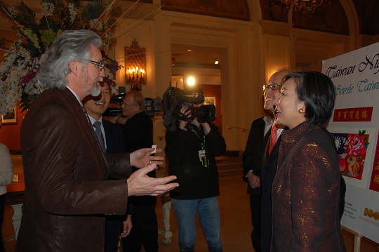 Dr. David Lee and Mrs. Lee welcome guests.