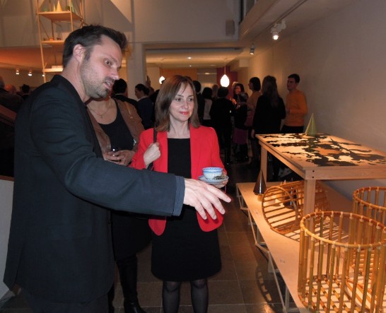 Matti Klenell, one of the designers of the exhibition A New Layer, explaining the art process to Boriana Åberg, member of parliament.