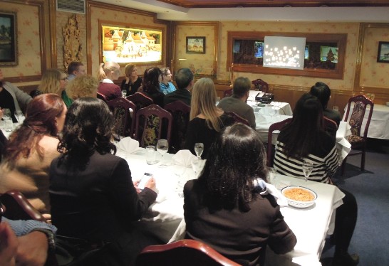 The travel agents are looking at promotion video Time for Taiwan. 