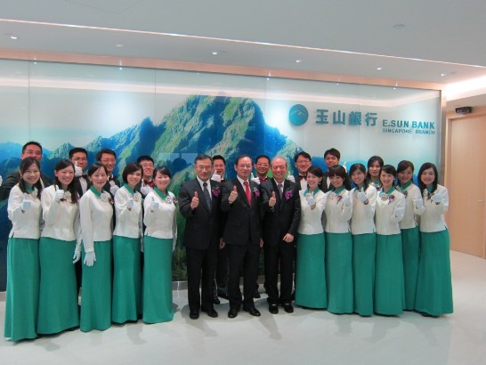 and Mr Gary K.L. Tseng, Chairman of E. Sun Bank (6th person from the left front row) joins managerial staff and colleagues for a group photograph, 23 Jul 2012.