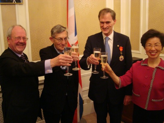 Ambassador Chang, Dr. Michael Reily, Lord Rogan and Lord Faulkner (from right to left) share a toast after the medal presentation Feb. 8.
