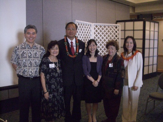 Director General Wang was a guest speaker for Hawaii International Real State, pictured with 