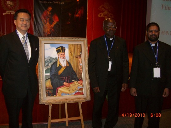 Ambassador Larry Yu-yuan Wang (first from left) takes a picture with Fr. Barthélemy Adoukono, Secretary of Pontifical Council for Culture, and Fr. Theodore Mascarenhas.