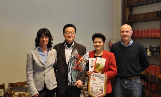 Ambassador and Mrs Wang (middle) with two members of the delegation