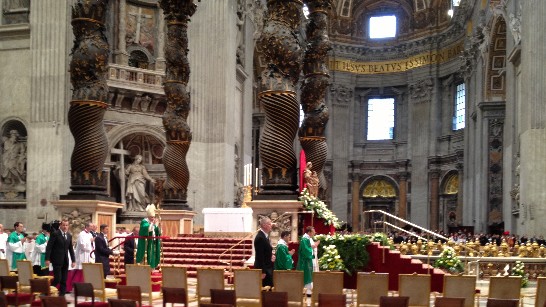 At the end of the Mass, Pope Benedict XVI is leaving St. Peter’s Basilica.