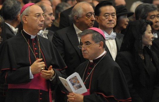 Ambassador and Mrs. Wang (2nd and 1st from right) and Archbishop Mamberti, Secretary for Relations with States (1st from left) during the Mass.