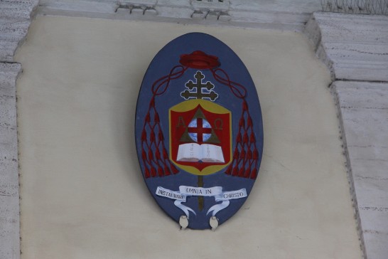 A close-up view heraldic emblem of the Church of St. Chrysogonus in Rome.