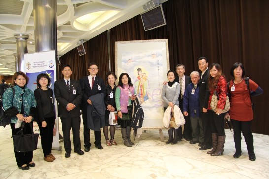 Ambassador Larry Wang (3rd from right) with the members of the AOS Taiwanese Delegation pose next to the painting inside the Synod Hall.