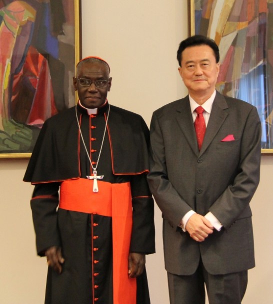 Ambassador Larry Wang (right) and Cardinal Robert Sarah (left).
