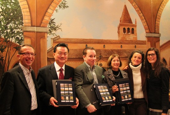 Ambassador Wang (2nd from left) and John Isacs with the Soave wine books received as gift