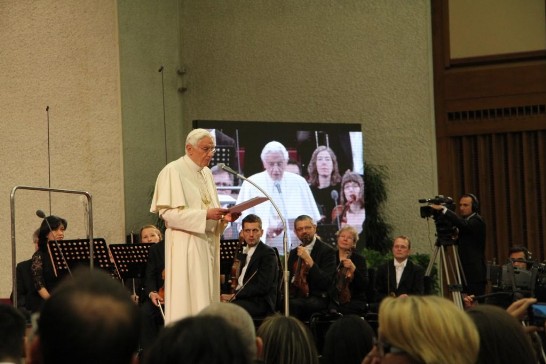Pope Benedict XVI addresses the crow after the concert