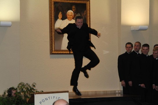 A seminarian sings and tap dances the famous song “Singing in the Rain.”
