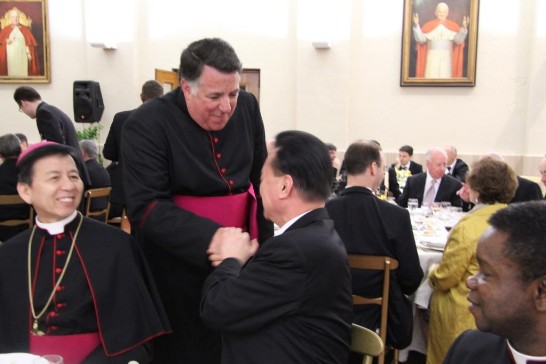 PNAC Rector Msgr. James F. Checchio（middle) greets Ambassador Wang at the ROC Embassy’s Table