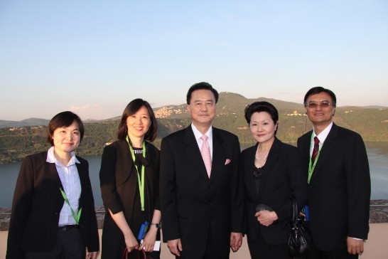 N.1: Ambassador and Mrs. Larry Wang (middle and 2nd from right) with the Embassy Staff and a view of the Albano Lake on their background.
