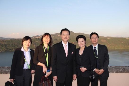 N. 2: Ambassador and Mrs. Larry Wang (middle and 2nd from right) with the Embassy Staff and a view of the Albano Lake on their background.