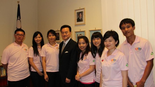 Ambassador Larry Wang (middle) poses with the seven Youth Ambassadors.