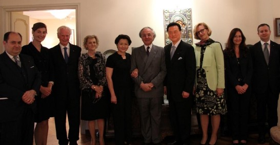 H.E. Jean-Pierre Mazery (5th from right) poses between Ambassador and Mrs. Larry Wang (4th from right and 5th from left).