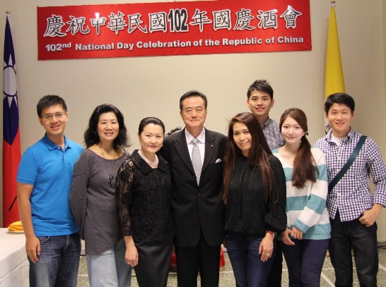 Ambassador and Mrs. Wang (3rd and 4th from left) with China Airlines crew members.