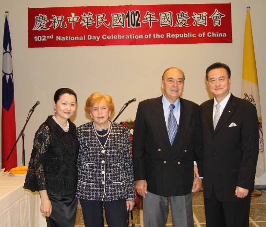 Ambassador and Mrs. Wang (1st from left and 1st from right) pose with Mr. Carlos Rios and his wife (2nd from right), 2nd from left).