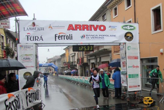 Taiwanese athlete Chen, Shu-Hua crosses the finishing line and ranks second.