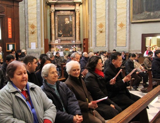 Ambassador and Mrs. Larry Wang (1st, 2nd from right) and Sister Carmen Zaballa (middle) sing during Chinese New Year Mass.