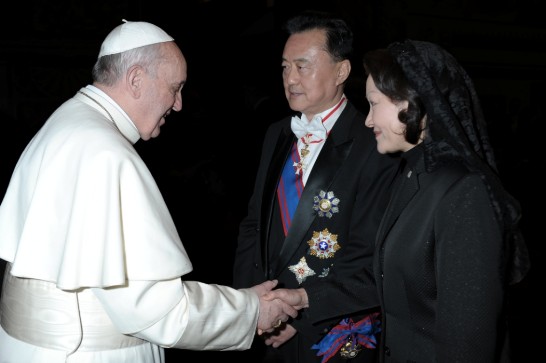 Pope Francis welcomes Ambassador and Mrs. Larry Wang.