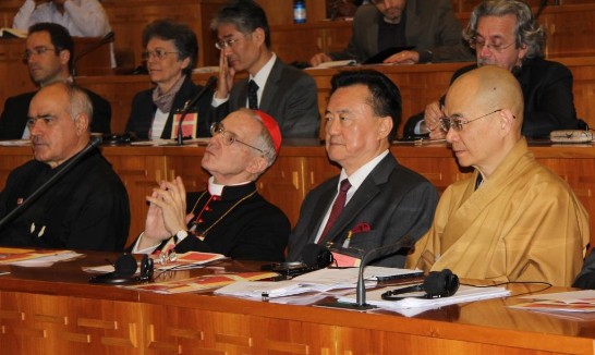 Cardinal Jean-Luis Tauran (3rd from left), Ambassador Larry Yu-yuan Wang (2nd from right) and Venerable Hui-min Shi (1st from right) listen to the Conference inside the Auditorium. 