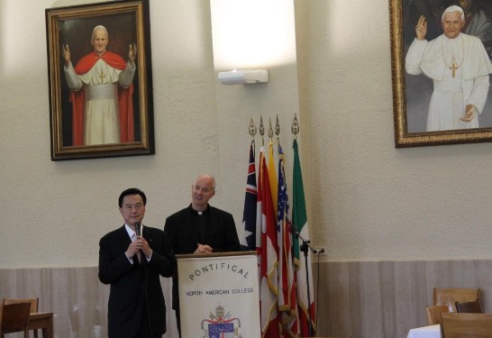Ambassador Larry Wang (left) thanks Fr. Timothy McKeown (right) for hosting a lunch in honour of the Youth Ambassadors.