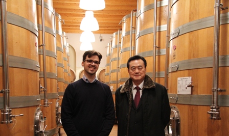 Ambassador Larry Wang and Mattia Cottini among the barrels of famous Amarone wine.