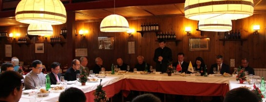 A moment of prayer led by Archbishop Hon (standing)