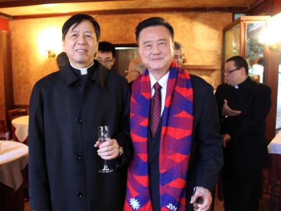 Ambassador Larry Wang (right) and Archbishop Hon (left) during the toast.