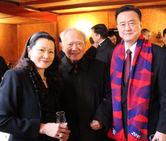 Ambassador and Mrs Larry Wang stand next to Msgr. Vincenzo Shih (middle).
