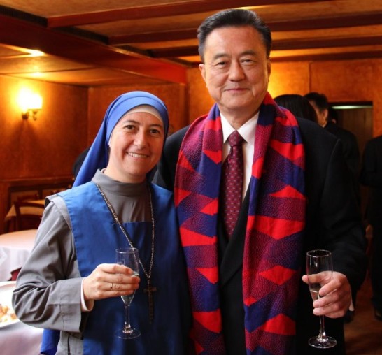 Ambassador Larry Wang (right) with an Argentine sister who has lived and served in Taiwan.