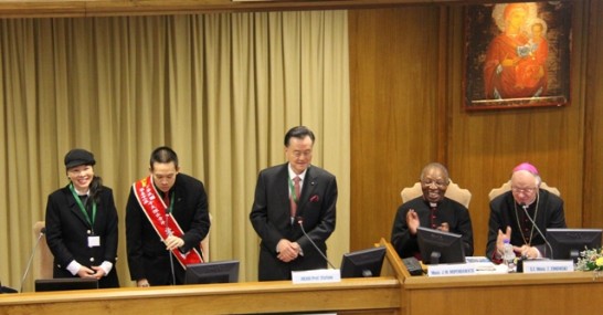 Ambassador Larry Wang (middle) introduces Leland (2nd from right) and his mother Karen (1st from left) to the public, in the presence of Msgr. Musivi Mupendawatu (2nd from right) and Archbishop Zimowski (1st from right).