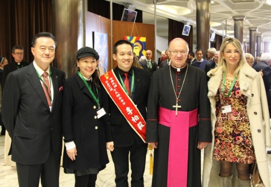 Group picture with Ambassador Larry Wang (1st from left), Karen (2nd from left), Leland (middle), Archbishop Zimowiski (2nd from right) and an attendant.