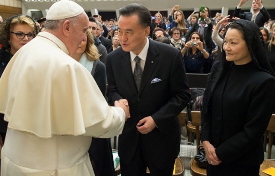 Ambassador and Mrs. Larry Wang (middle, 1st from right) greet Pope Francis after the Audience. (1st from left).