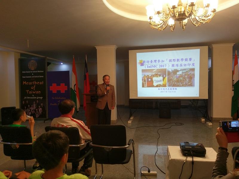 Amb. Tien photographed with the mathematics delegates at TECC.