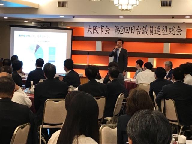 特別講演する李処長