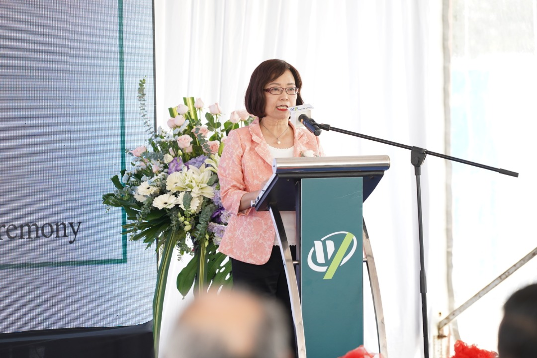 Representative Anne Hung addresses the ceremony.