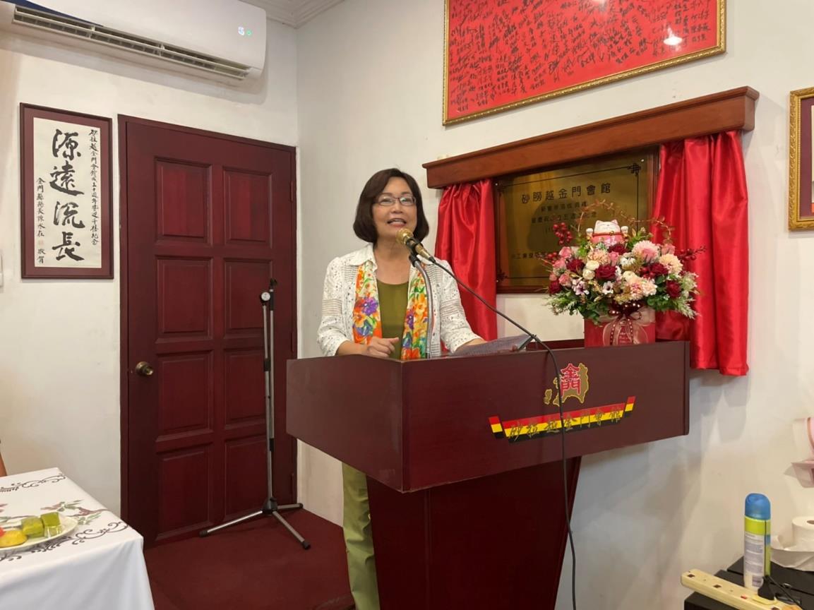 Representative Anne Hung delivers a speech.