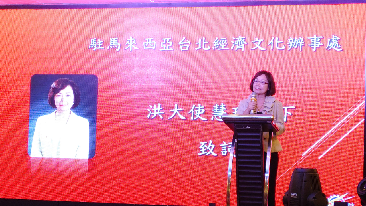 Representative Anne Hung delivers a speech.