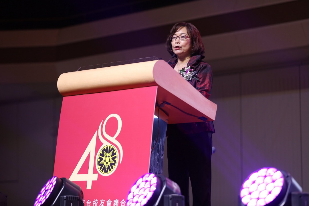 Representative Anne Hung delivers a speech.