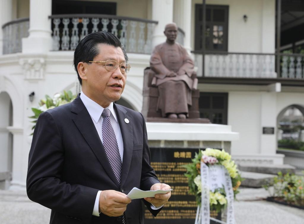 Representative Francis Liang giving his address at the memorial service.